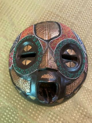 Hand Carved Wooden African Tribal Mask,  Round With Beads,  Cowry Shells And Brass