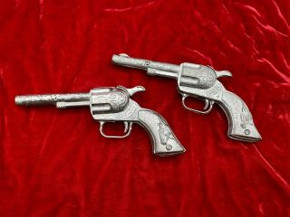 2 Vintage Smoky Metal Toy Play Guns Silver Cowboy Western Collectible