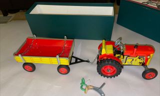 Vintage Schylling Clock Work Tractor And Trailer W/key