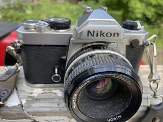Nikon 35mm Slr Film Camera W/ Nikkor 50mm 1:2 Lens,  Strap Vtg Fm3472215