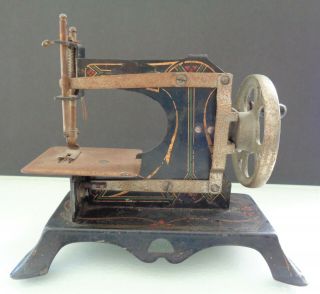 Antique Collectible Hand - Painted Cast Iron Toy Sewing Machine.