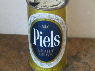 Piels.  Light Beer.  Real Beauty.  Inside.  Flat Top