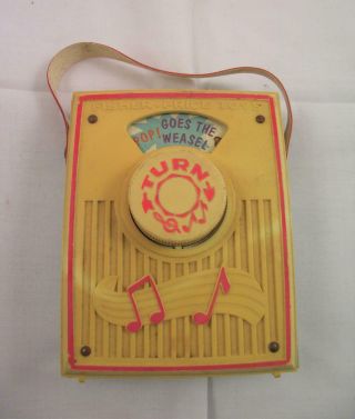 Vintage Fisher Price Pocket Wind Up Music Box Toy Pop Goes The Weasel