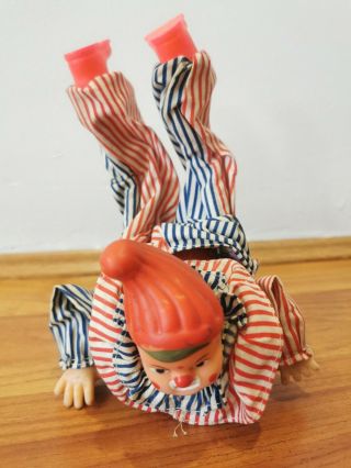 Vintage Red China Clockwork Arcobat Clown Tin Toy.