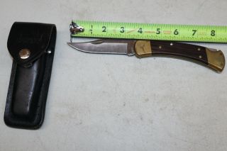 Buck 110 X U.  S.  A.  Folding Lockback Single Blade Knife With Sheath