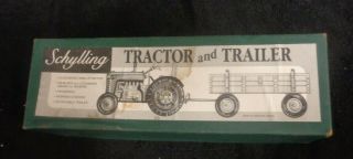 Vintage Schylling Tractor And Trailer Tin Toy And Key