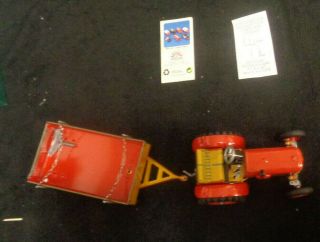 VINTAGE SCHYLLING TRACTOR AND TRAILER TIN TOY AND KEY 3