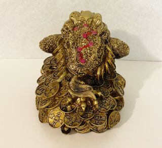 Turd Frog Sitting On Money Coins Statue Made With Resin In Ancient Brontz Color