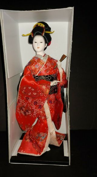 Japanese Geisha Porcelain Doll With Fan In Red Kimono