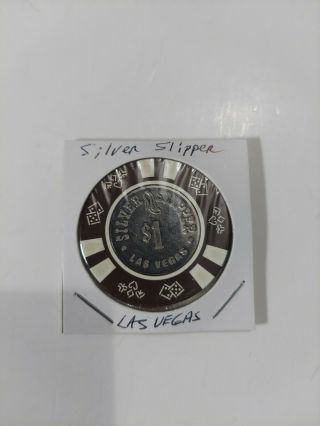 1.  00 Silver Slipper Casino Chip From Las Vegas