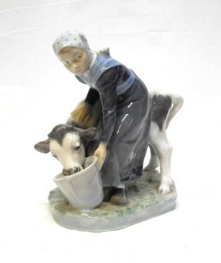 Vintage Denmark Royal Copenhagen Porcelain Figurine " Girl Feeding Calf Cow " 779