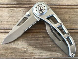 Gerber Pocket Knife 2 1/4 " Frame Lock Combo Edge Blade,  W/belt Clip,  Thumb Studs