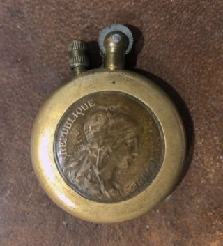 World War I Trench Art Brass Lighter,  French Coin Front,  Engraved Design On Back