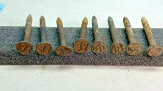 Variety Of Eight (8) Railroad Date Nails - Check Out The Font On The1955 Nail