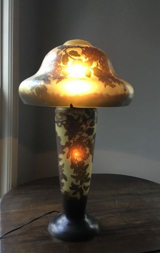 Galle glass desk table lamp.  Gréa.  Moss green.  About 33” high 2