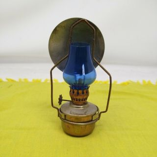 VINTAGE MINIATURE OIL LAMP WALL MOUNTED WITH REFLECTOR AND BLUE GLASS CHIMNEY 2