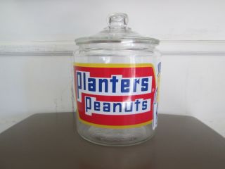 Planters Peanut Jar With Lid Stands 10 Inches Tall And 6 3/4 Inches Wide