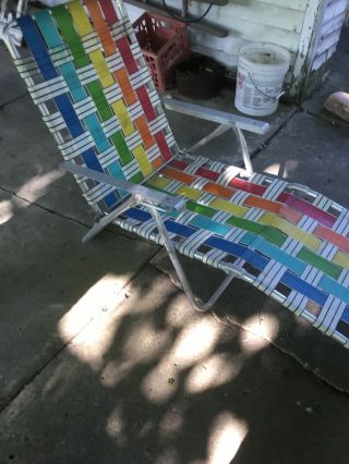 vintage webbed aluminum lounge chair,  rainbow colors, 2
