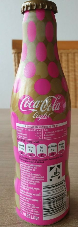 Coca Cola alu bottle from Germany.  Zac Posen Designer.  1 full bottle 3