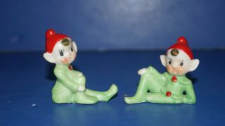 Pair Vintage Elves Elf Pixie Green Porcelain Christmas Figurines With Red Hats