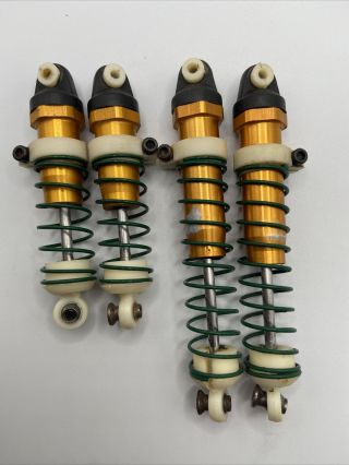 Vintage Rc10 Team Associated Gold Pan Front And Rear Shocks/green Springs