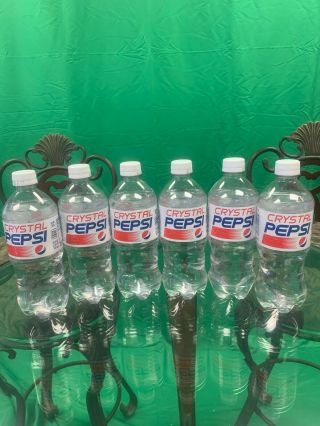 6 Individual Crystal Pepsi 20 Oz.  Plastic Bottles Expired Nov.  2017