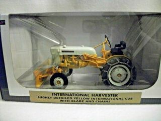 Speccast International Harvester Cub Tractor With Blade & Chains - 1:16