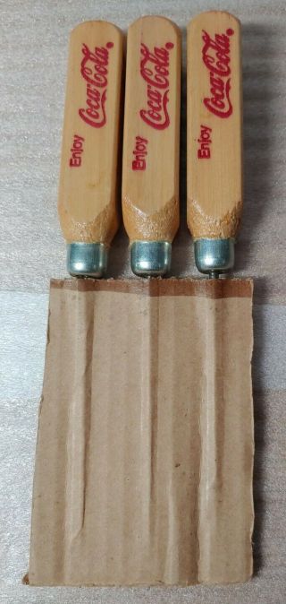 Sleeve Of 3 Vintage Coca Cola Advertising Wooden Handled Ice Picks.