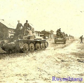 Awesome German Pzkw.  38 (t) Panzer Tanks Passing Village On Move; Russia