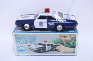 Vintage Sears Tin Battery Operated Nonstop Action Police Car W/ Box