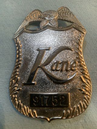 Vintage/obsolete - - Kane Protection - Numbered (91752) Security Officer Badge