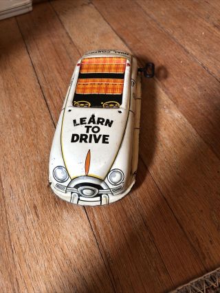 1950s Vintage Marx Tin Litho Driver Training Windup Car.  " Learn To Drive ".
