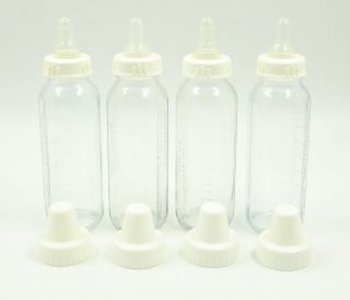 Vintage Evenflo 8 oz Glass Baby Bottles 4,  Dr.  Brown ' s Size 1 Nipples 2