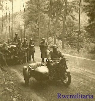 Great Wehrmacht Kradmelder On Motorcycle By Column Stopped On Road