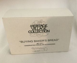 Dept 56 Heritage Village Buying Baker 