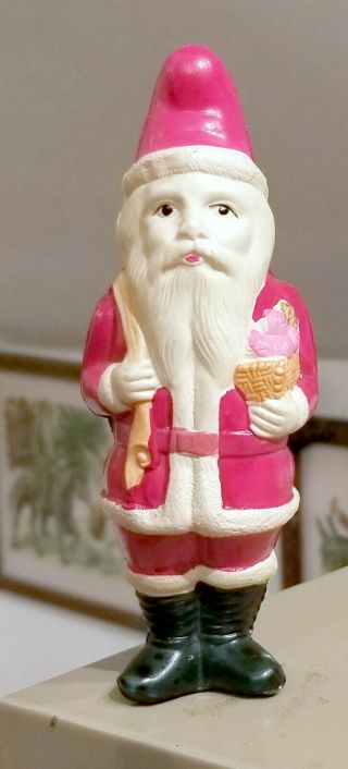 Larger Santa Claus,  With Doll,  Holding Fruit Basket.  1920s,  Japan.  Celluloid.