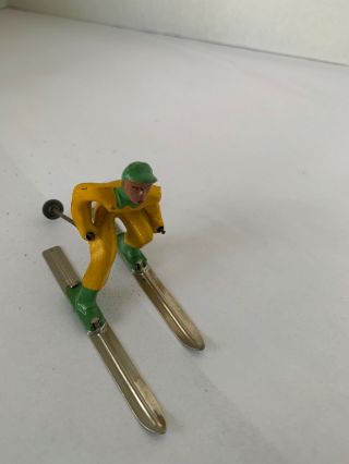 Vintage Barclay Metal Skier Yellow With Green Enamel Winter Sport Lead Toy