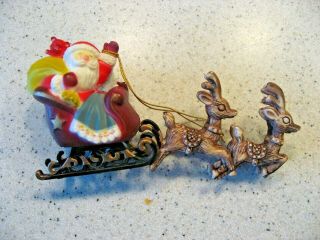 Vintage Plastic Santa Claus And Sleigh With Four Reindeer Christmas Ornament