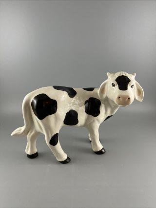 Vintage Black & White Ceramic Cow Figurine Unbranded 6.  25” Tall 8.  5” Long