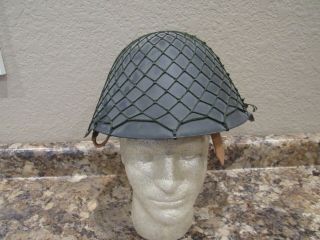 Post Wwii East German Helmet With Camo Net,  Liner,  And Chinstrap