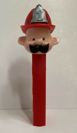 Vintage Pez Dispenser Red Fireman With Mustache,  No Feet Made In Usa.