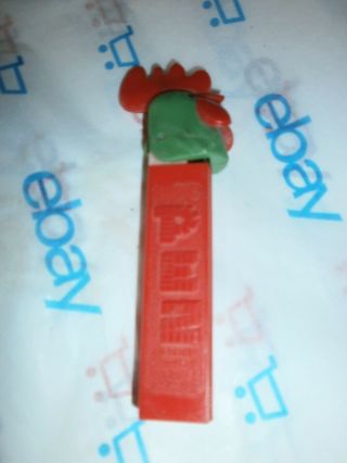 Pez,  Vintage Orange W/green Head,  (no Feet) Candy Dispenser,  2 - 620 - 061
