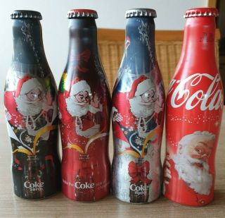 Coca Cola Alu Bottle From Benelux.  Christmas.  4 Empty Bottles