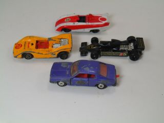 Four Vintage Tomica Diecast Cars - Nissan,  Mazda,  Lotus