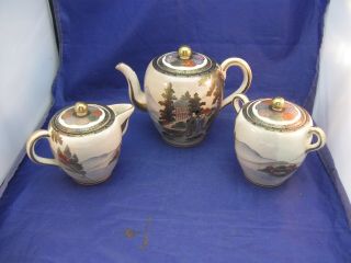Oriental Tea Pot,  Creamer And Sugar Bowl.  - Decorated With Scenes Of Japan