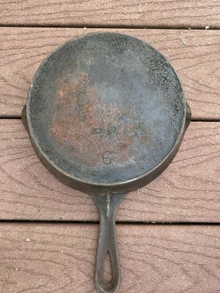 No.  6 Cast Iron Skillet With Heat Ring Sits Flat Wapak? Pique?