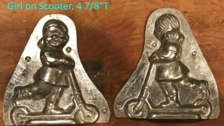 Vintage Metal Chocolate Mold Of Girl On A Scooter,  Unknown Maker,  4 7/8 " Tall