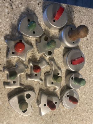13 Vintage Tin Metal Cookie Or Biscuit Cutters,  Some With Wooden Knob Handles