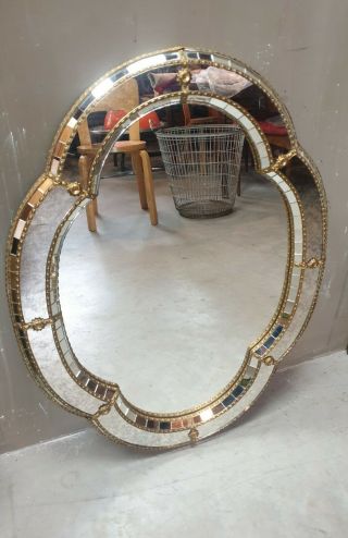 Vintage Oval Mirror With Brass Decorations