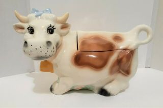 Vintage Large Brown And White Holstein Cow Cookie Jar Blue Bow Grass Pink Flower